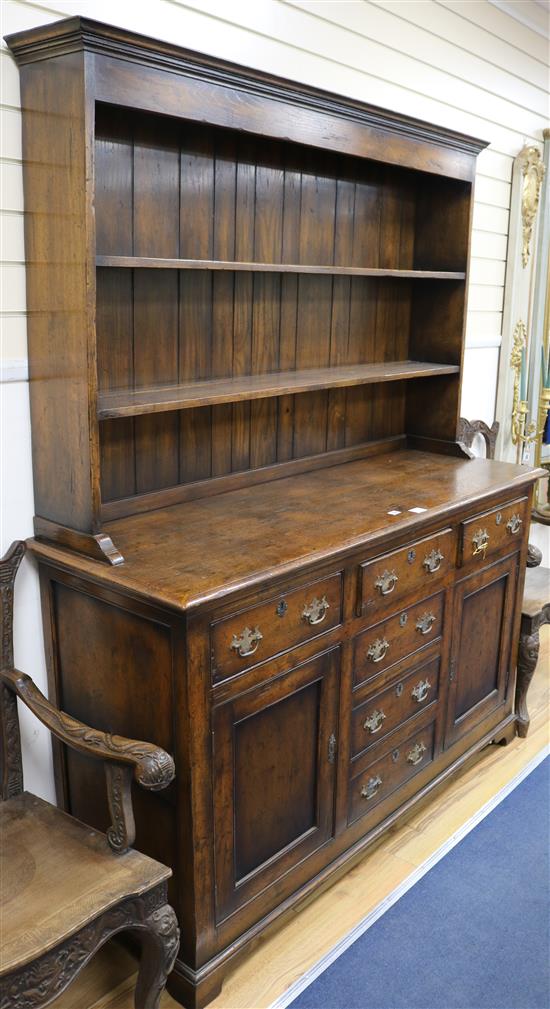 A mid 18th century style oak dresser, W.155cm